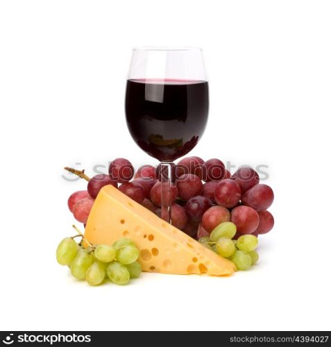 Full red wine glass goblet and grapes isolated on white background