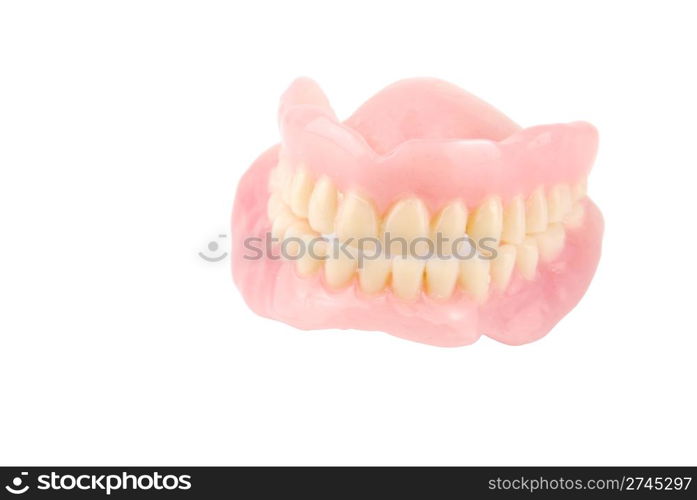 full set of acrylic denture isolated on white background