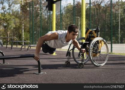 full shot disabled man doing push ups