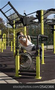full shot disabled man doing sport park