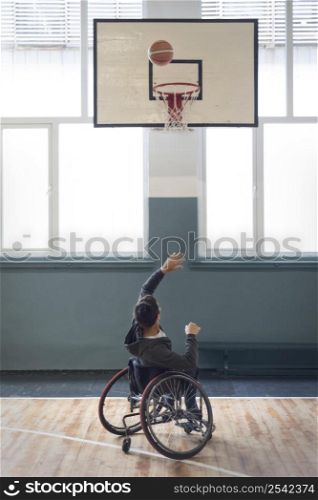 full shot disabled man throwing ball