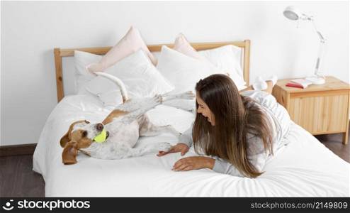 full shot girl bed with dog