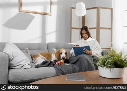 full shot girl couch with dog