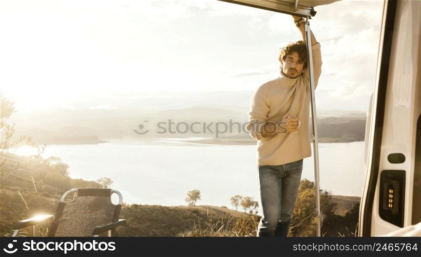 full shot man with cup outdoors