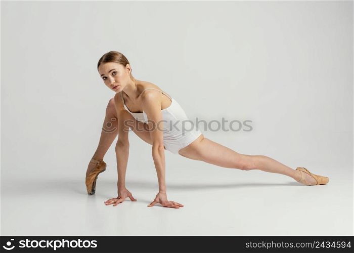 full shot talented woman doing splits