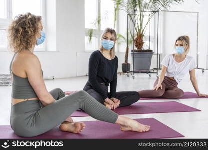 full shot women wearing masks