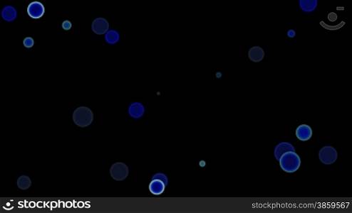 Full-spheres (circles) chaotically fly against a dark background