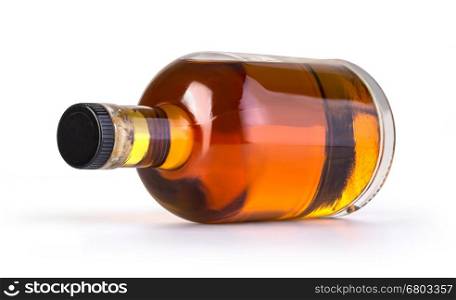 Full whiskey bottle isolated on white background with clipping path