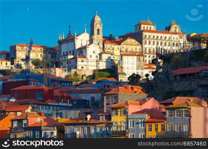 Fun colorful houses in Old town of Porto, Portugal. Aerial view with traditional multicolored quaint houses in Old town of Porto in the sunny morning, Portugal