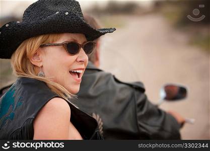 Fun couple riding a motorcycle