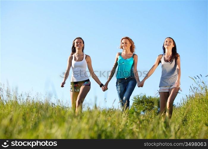 fun smile girlfriends run by green field sun is shine