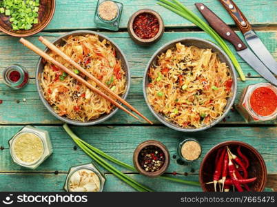 Funchoza,chinese noodles with spices and chicken.Glass noodles. Funchoza or glass noodles