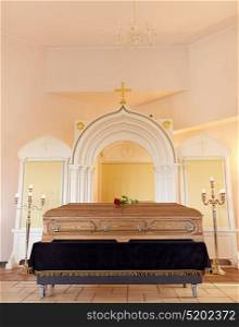 funeral and mourning concept - coffin at christian orthodox church. coffin at funeral in christian orthodox church