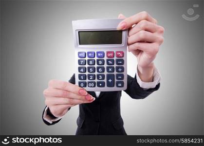 Funny accountant with calculator on white
