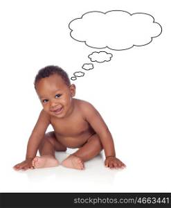 Funny african baby sit on the floor isolated on a white background thinking