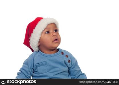 Funny african baby with Christmas hat isolated on a white background