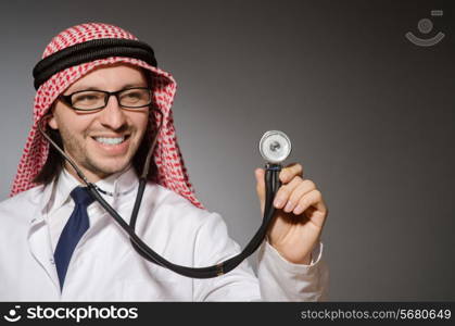 Funny arab doctor with stethoscope