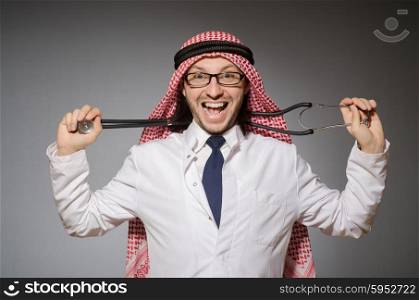 Funny arab doctor with stethoscope