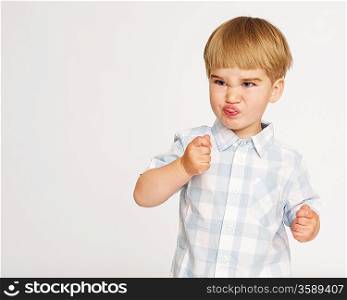 Funny baby boy in chekered shirt