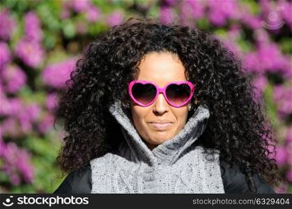 Funny black girl with purple heart glasses