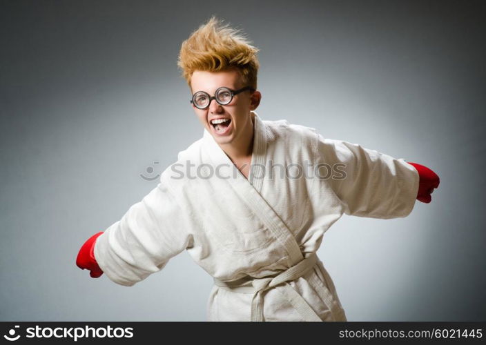 Funny boxer against dark background