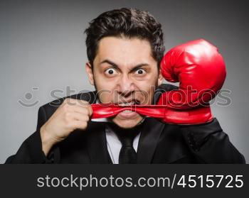 Funny boxer businessman in sport concept