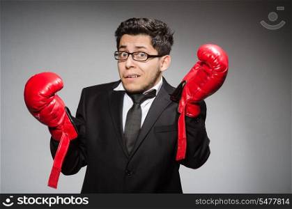 Funny boxer businessman in sport concept