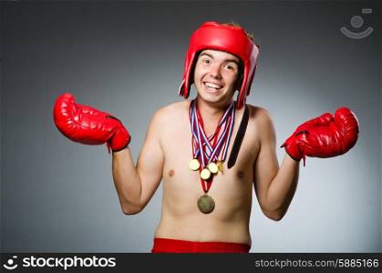 Funny boxer with winning gold medal