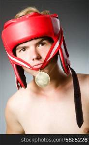 Funny boxer with winning gold medal
