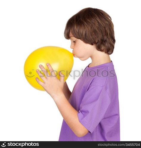 Funny boy blowing up a yellow balloon isolated on white background