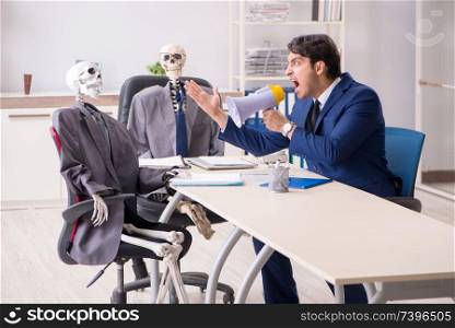 Funny business meeting with boss and skeletons