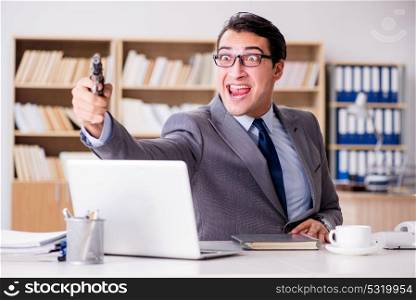 Funny businessman with gun in office