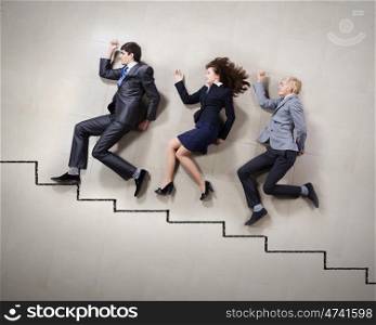 Funny businesspeople. Young people in business suits lying on floor
