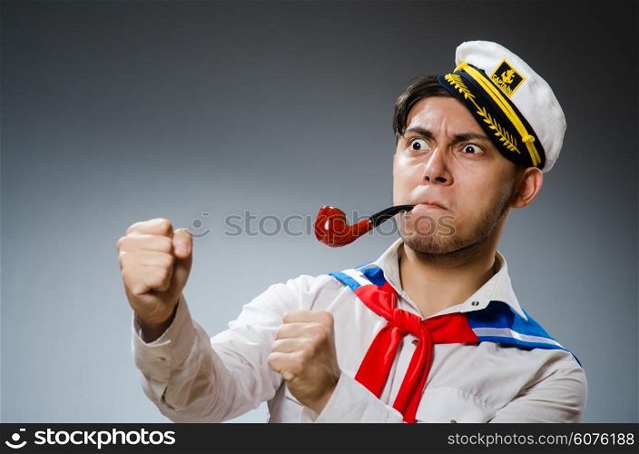 Funny captain sailor wearing hat