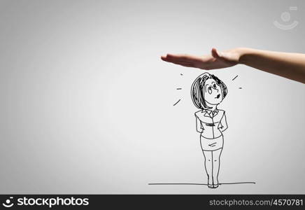 Funny caricature. Close up of human hand and pencil sketches