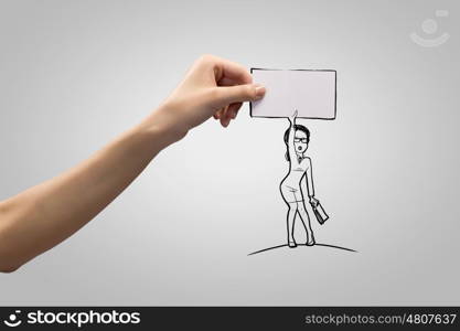 Funny caricature. Human hand and caricature of funny businesswoman with banner