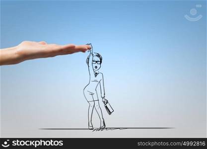 Funny caricature. Human hand and funny caricature of businesswoman