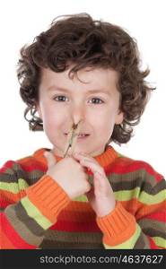 Funny child covering the nose with a pin isolated on a white background