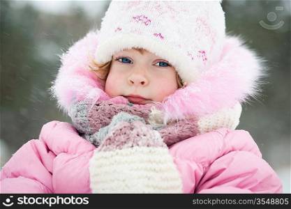 Funny child in winter park
