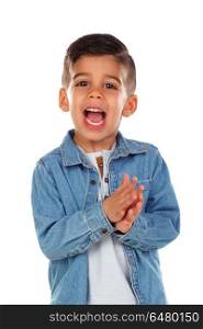 Funny child with dark hair clapping and singing isolated on a white background