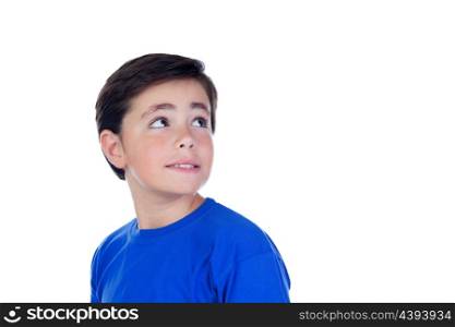 Funny child with ten years old and blue t-shirt looking up isolated on a white background