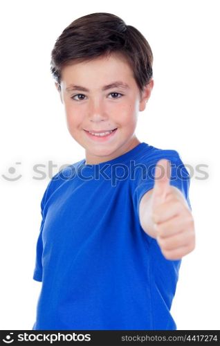 Funny child with ten years old and blue t-shirt saying Ok isolated on a white background