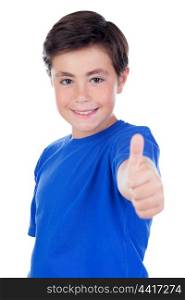 Funny child with ten years old and blue t-shirt saying Ok isolated on a white background