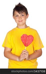 Funny child with yellow t-shirt with a big lollipop isolated on white background