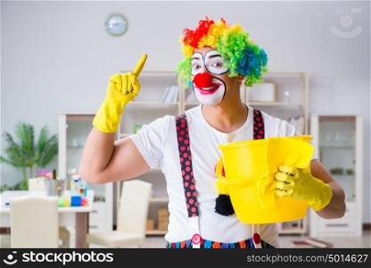 Funny clown doing cleaning at home