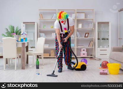 Funny clown doing cleaning at home