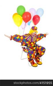 Funny clown flying through the air in his lawn chair with helium balloons attached. Isolated on white.
