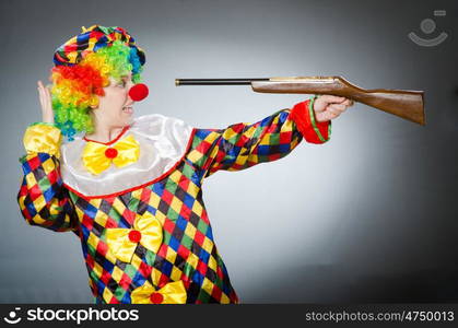 Funny clown in comical concept