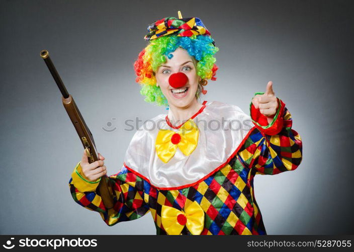 Funny clown in comical concept