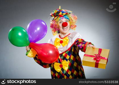 Funny clown in comical concept